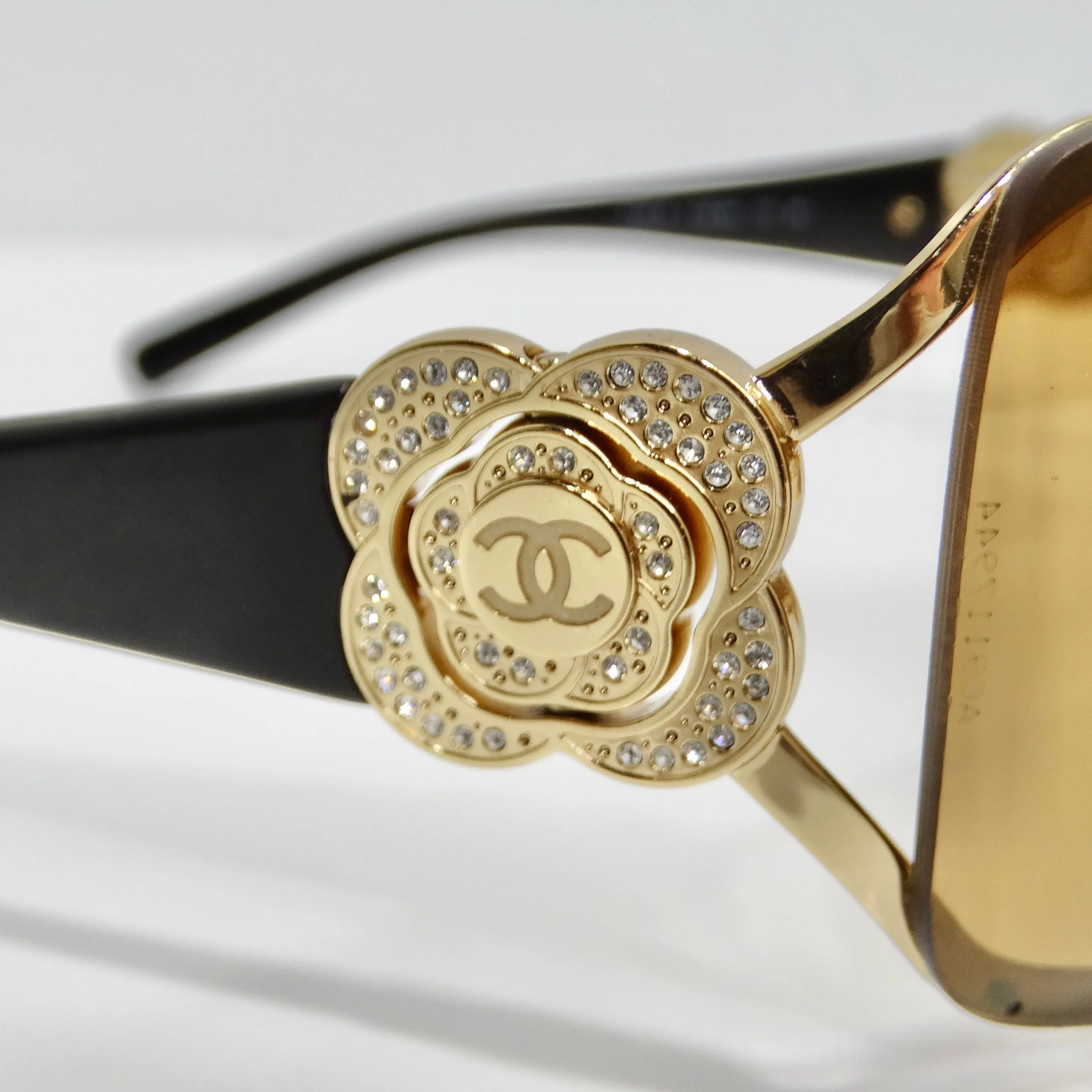 Chanel 1990s Gold Tone Camelia Shield Sunglasses