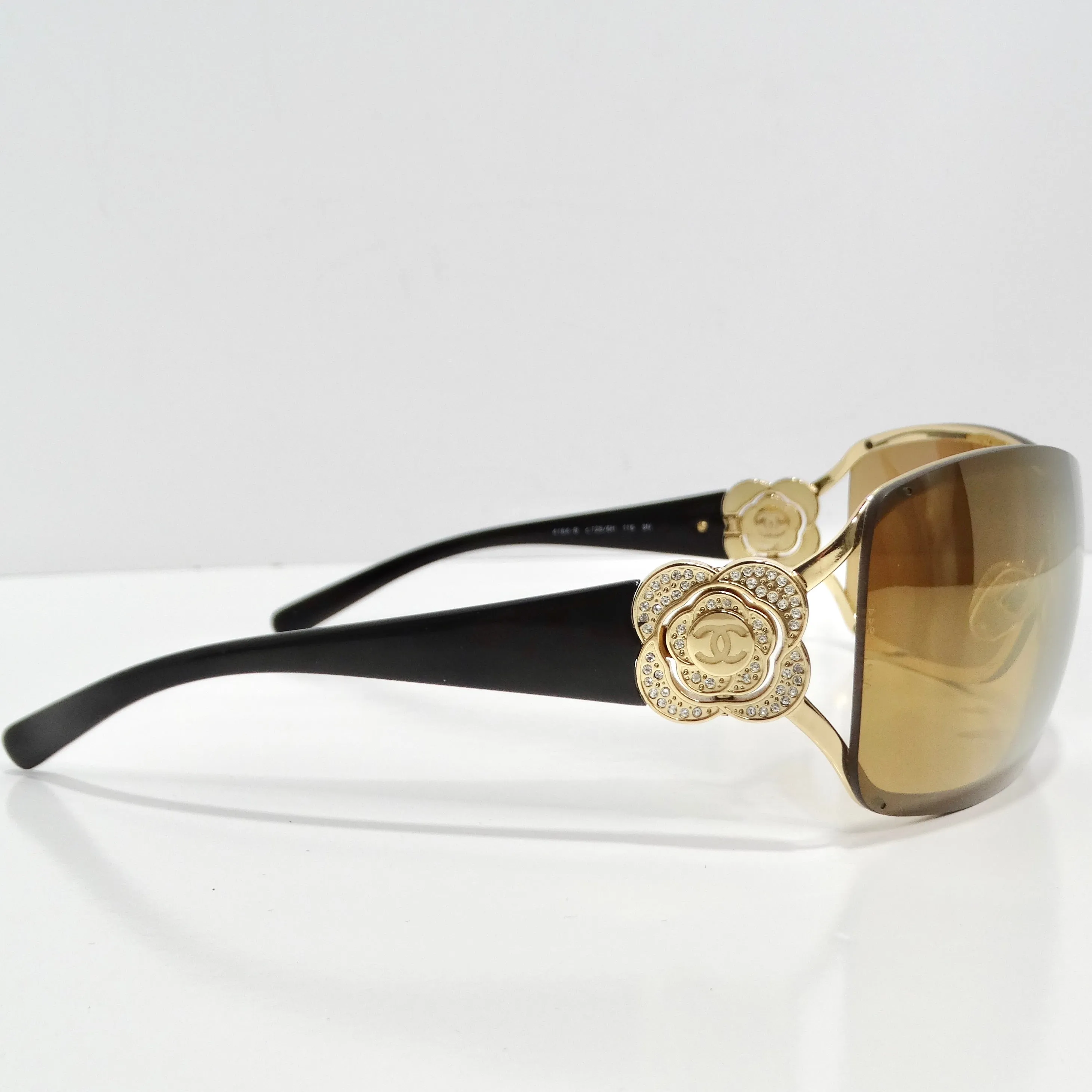 Chanel 1990s Gold Tone Camelia Shield Sunglasses