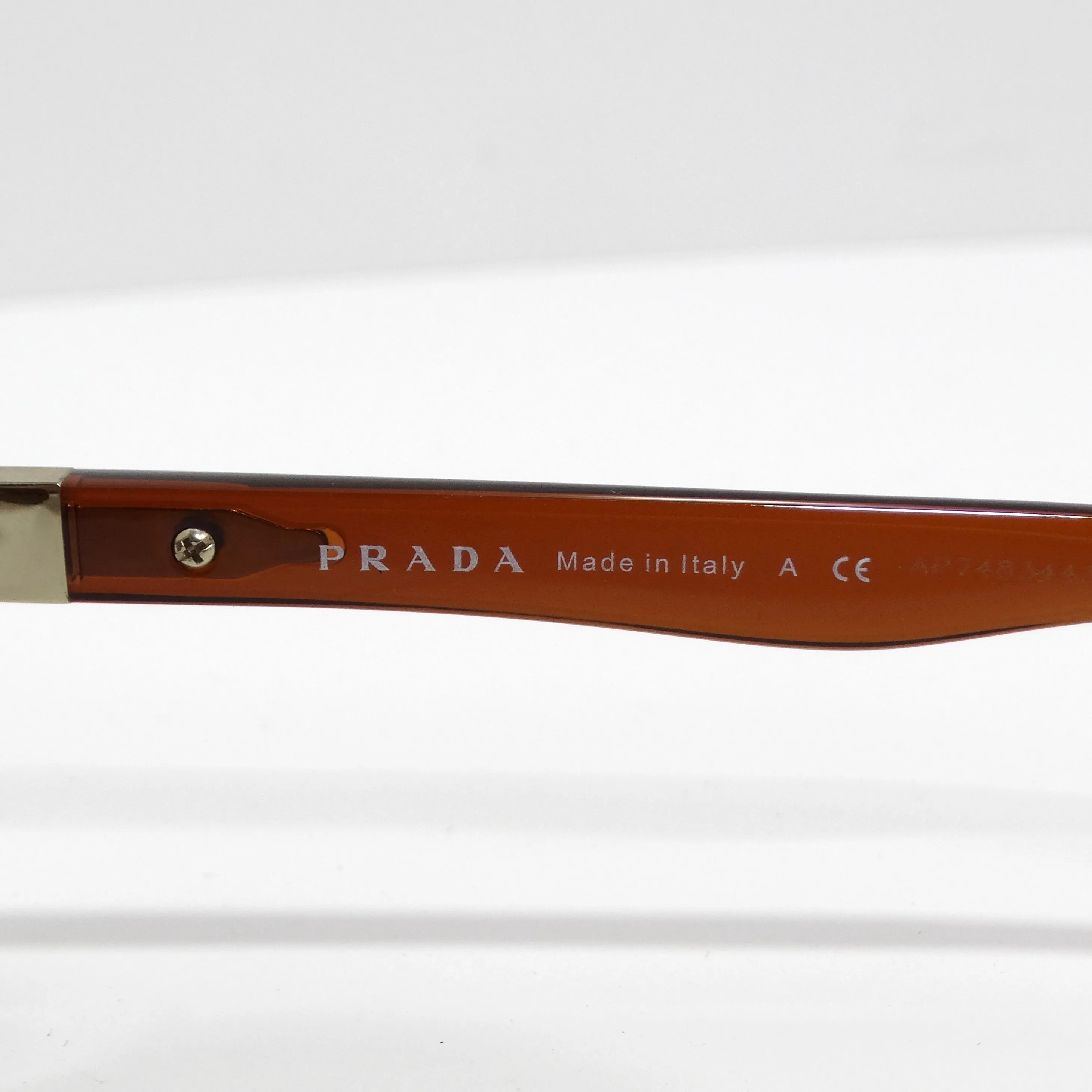 Prada 1990s Brown Gold Tone Aviator Sunglasses