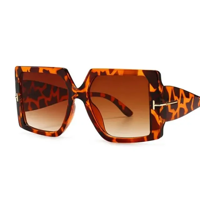 Stylish, versatile and feminine fashion large design bold sunglasses.