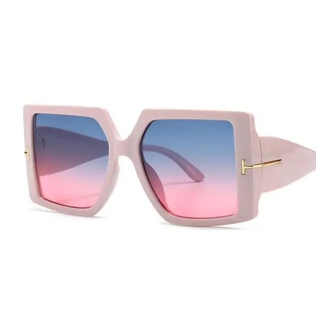 Stylish, versatile and feminine fashion large design bold sunglasses.