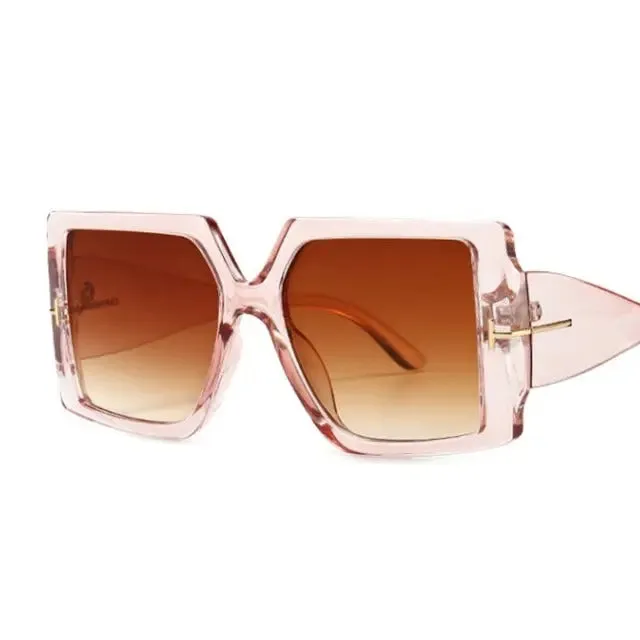 Stylish, versatile and feminine fashion large design bold sunglasses.